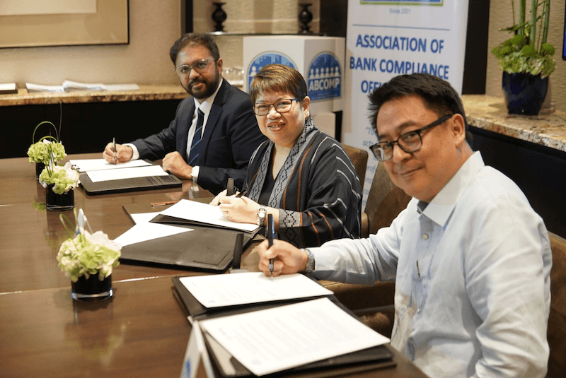 Tookitaki CEO Abhishek Chatterjee, ABCOMP President Ma. Bernadette Ratcliffe, and ABCOMP Vice President Joel Pascioles